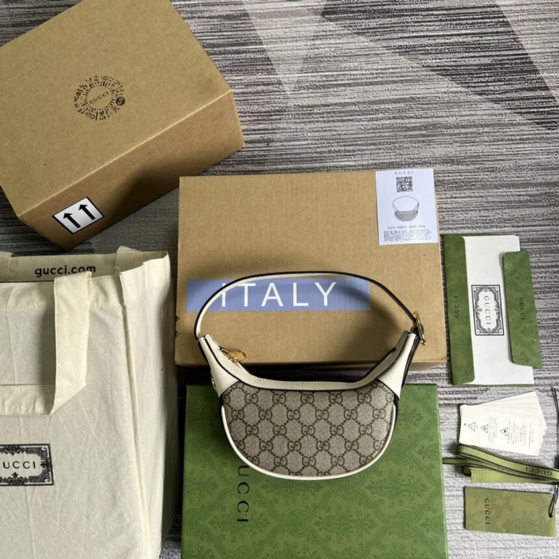 G*u*i top handle bags